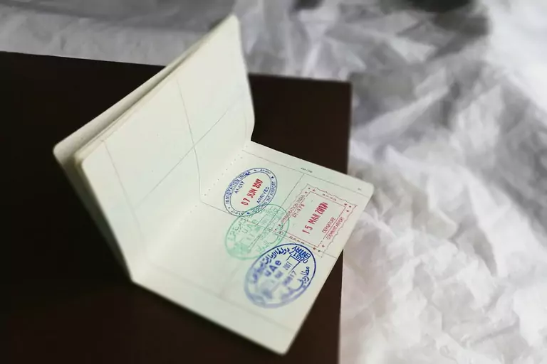 Passport with entry stamps for visa invitation support